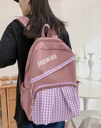 حقيبة ظهر وردي