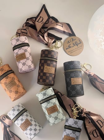 ميدالية حقيبة عطر او روج