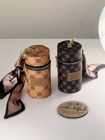 ميدالية حقيبة عطر او روج