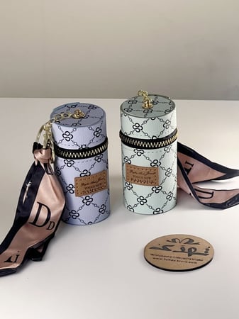 ميدالية حقيبة عطر او روج