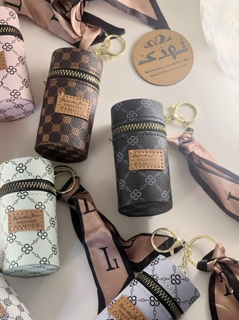 ميدالية حقيبة عطر او روج