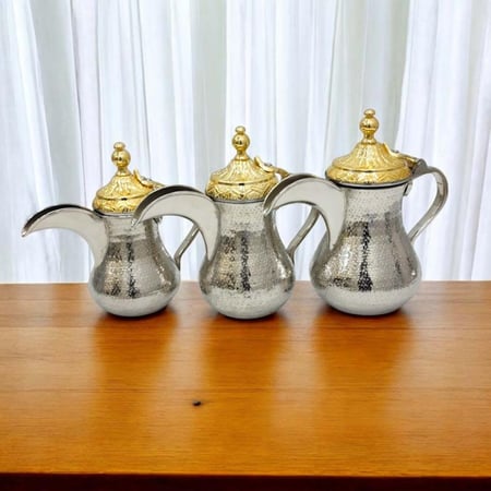 دلة معدن حب الرمان لونين