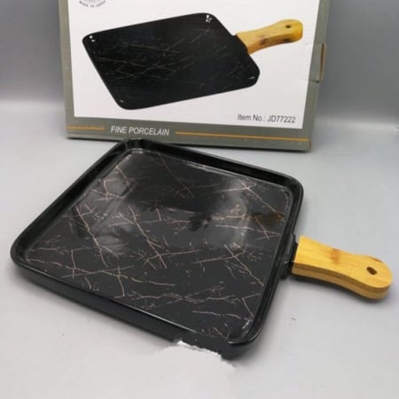 صحن بورسلان يد خشب