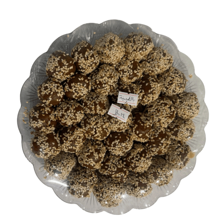 تمر محشي بالطحينة بالسمسم