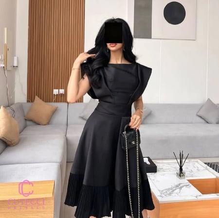 فستان سهرة أسود ميدي بكم مميز وتنورة بكسرات ميكادو أنيقة