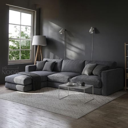 كنب زاوية مودرن حرف L بلون رمادي بتصميم فخم