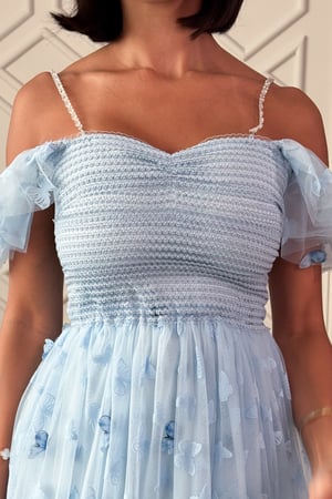 فستان ميدي تول بطبعة فراشات لون بيبي بلو