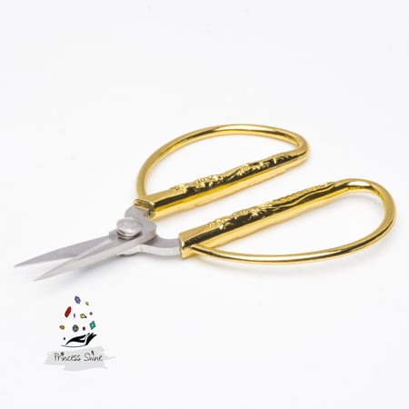 203 - مقص ورق ذهبي