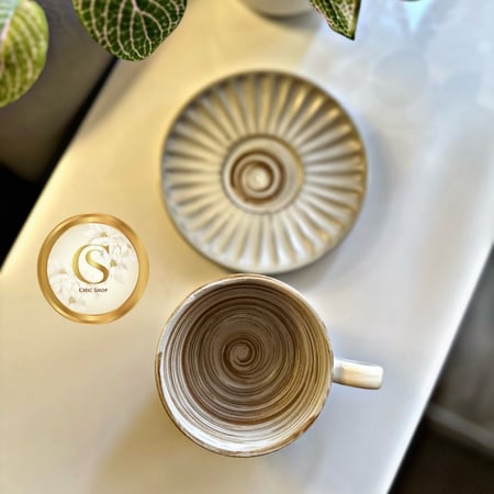 كوب فخار مع صحن