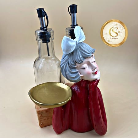 تحفة مع حامل علب الزيت