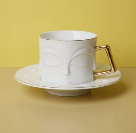 كوب الوجوه المتعدده مع صحن