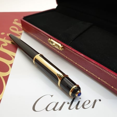قلم ماركة كارتير اسود وذهبي