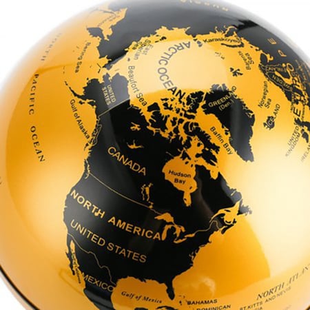 كرة أرضية جغرافية عائمة مع منصة على شكل كتاب.