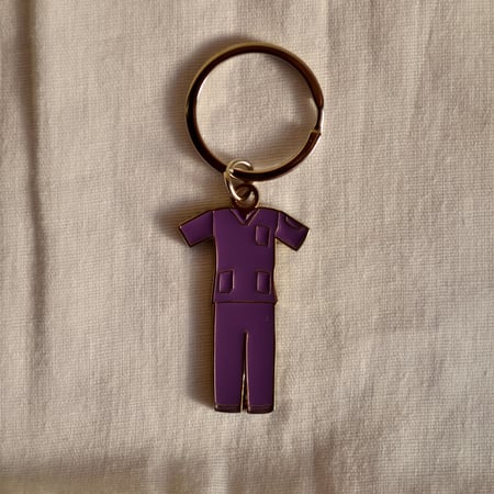 ميدالية مفاتيح شكل سكراب