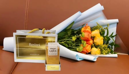 باقة شمس وهدوء – باقة ورد أصفر وبرتقالي نابضة بالحياة مع شوكلاتة فيريرو او أنوش  او باتشي او البستاني الفاخرة