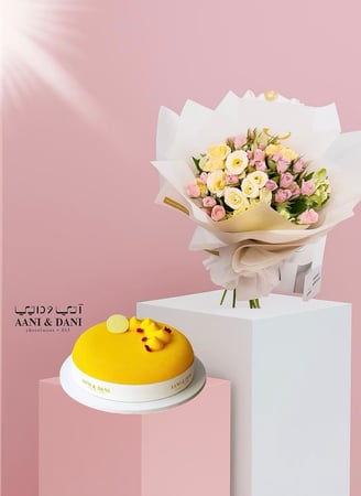 باقة بيبي ورد أصفر ووردي مع كيكة أني داني صغيرة