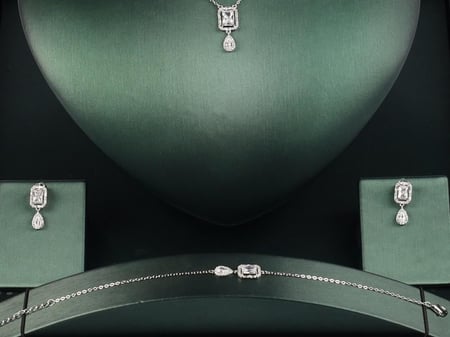 بيان طقم فضه 925 قلاده و خاتم و سوار واقراط