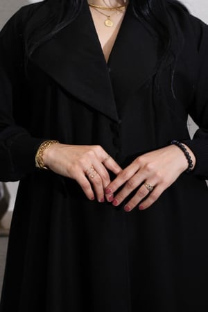 عباية  نص  كلوش بتدخيله مطاط على الكم