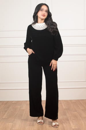 طقم أسود أنيق بياقة مزخرفة