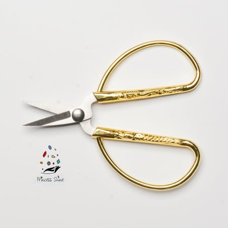 203 - مقص ورق ذهبي