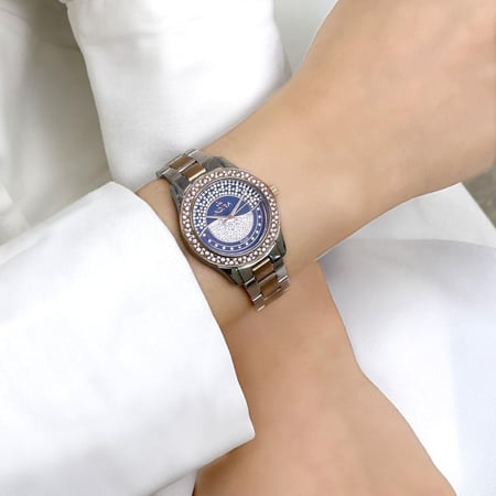 ساعة نسائية استيل بلون الروزقولد و الفضي اطار روز قولد ميناء ازرق