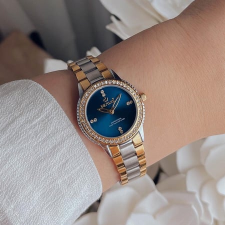 ساعة نسائية بفصوص زركون استيل بلون فضي و ذهبي