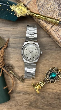 ساعة رجاليه ديفوشي ستيل فضي ميناء ذهبي