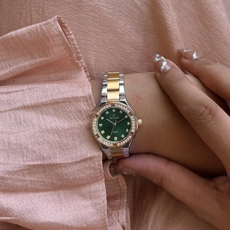 ساعة نسائية ديفوشي استيل بلون فضي و ذهبي ميناء أخضر