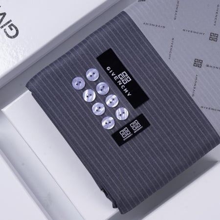 قماش جيفنشي مقلم فضي