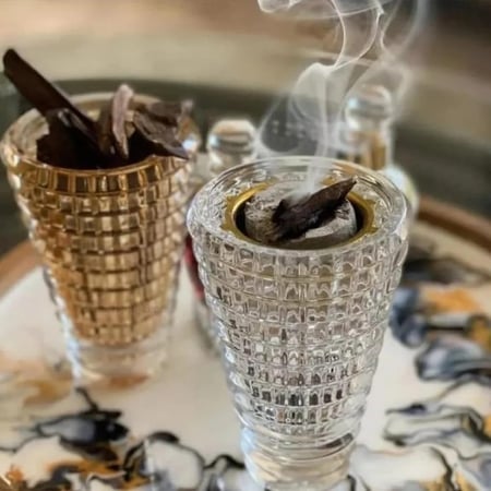 مجموعة 12 مباخر زجاجيه على شكل كريستال بتصميم اسطواني مع علب شفافه