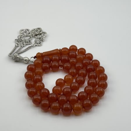 سبحة بكلايت بلجيكي لون بني شفاف بلمعة