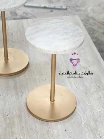 طاولة رخام بقاعدة حديد