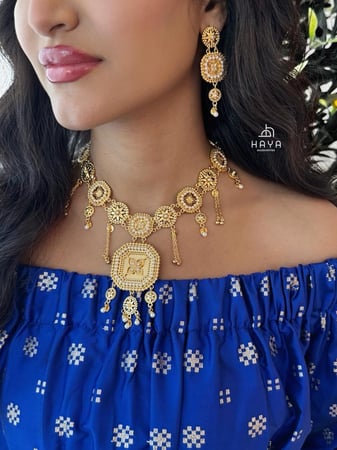 طقم بحريني بديل الذهب (عقد فاخر + حلق)