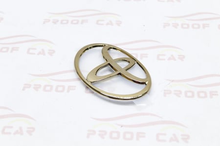 علامة تويوتا خلفية لكزس لاندكروزر 98 الى 2007 ذهبي  باب صفاق اصلي