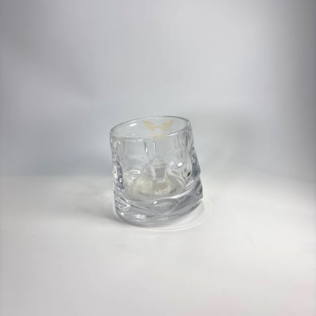 كوب زجاجي راقص الوجه