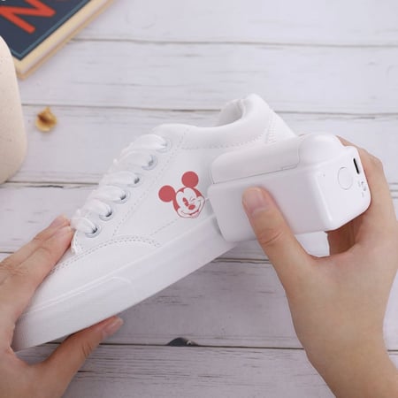 Hand-held printer with ink cartridge - طابعة صغيرة مع حبر