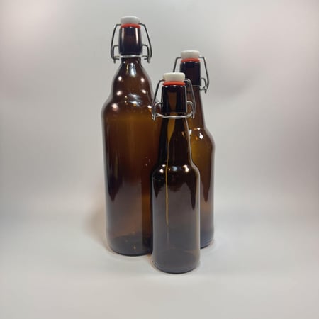 كرتون قوارير عنبر اللون عالي الجودة و تتحمل ضغط الغاز العالي ( 1000)مل) 1 لتر بغطاء كبس (30)