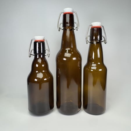 كرتون قوارير عنبر اللون عالي الجودة و تتحمل ضغط الغاز العالي 500 مل بغطاء كبس(70 حبة)