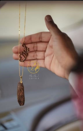 تعليقة العود مع قلب