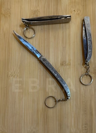 مطوية فضية - خوجه