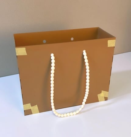 ارتق بهديتك مع حقيبة هدايا فاخرة من اليجنت تاول تصاميم أنيقة