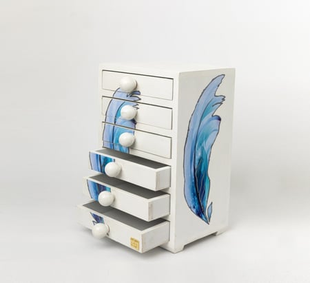 صندوق مٌزيّن بشكل الريشة