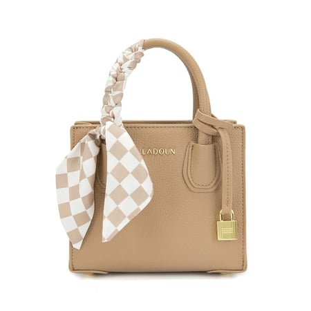 شنطة نسائية لون جملي من لادون