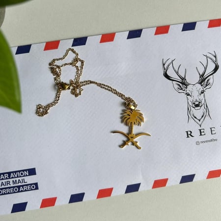 تعليقة السيفين والنخلة"ذهبي"