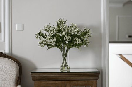 12 غصن من ورد الواكس