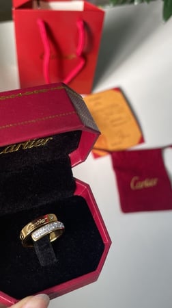 خاتم كارتير ذهبي مع ملحقاته
