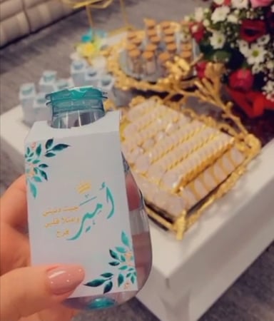 ثيم مولودجاهز للطباعه  باسم (امير )  (تعليقة ماء + تاق او استكر توزيعات )