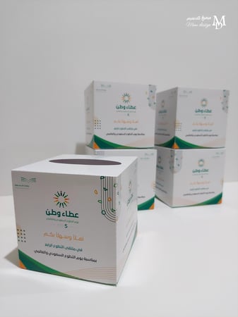 علب مناديل بثيم اليوم العالمي للتطوع