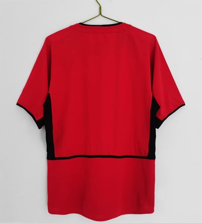 طقم مانشستر يونايتد موسم 2002-2004 احمر