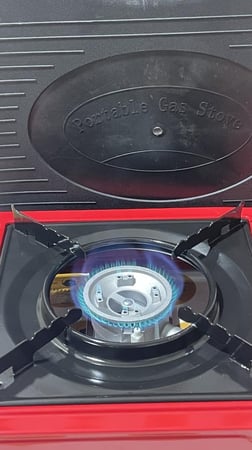 موقد رحلات سفري بشنطة يعمل على دبات الكبس ولي الغاز